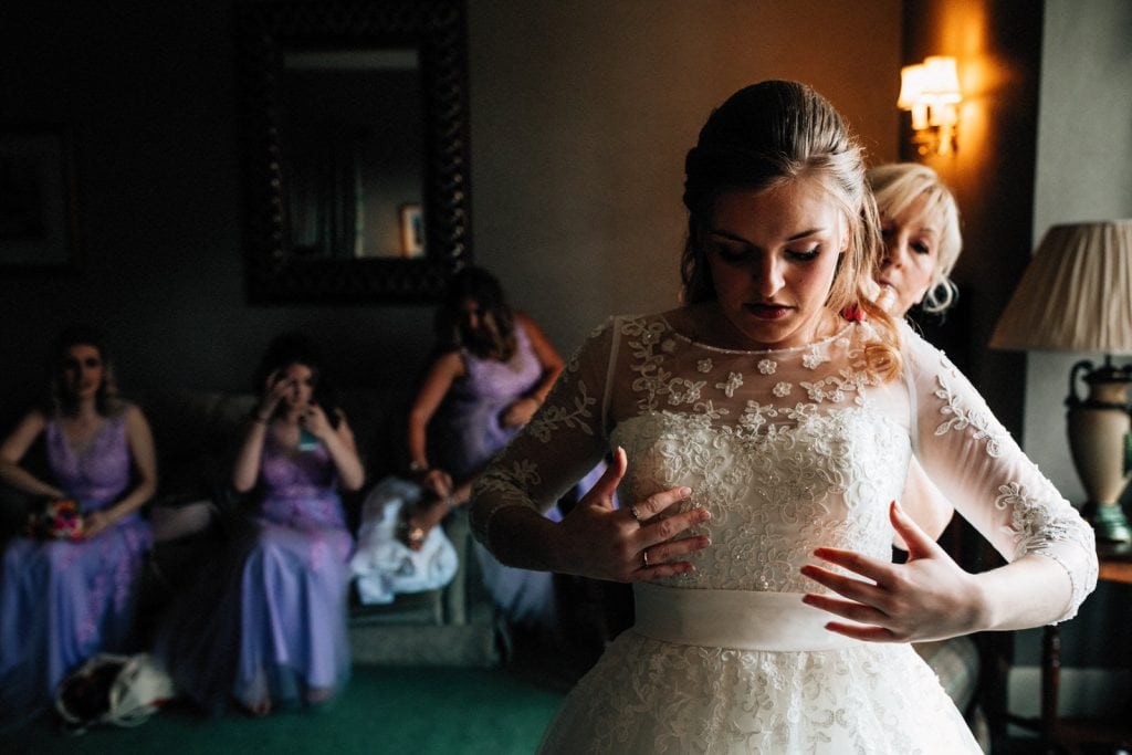 bride checking dress fits