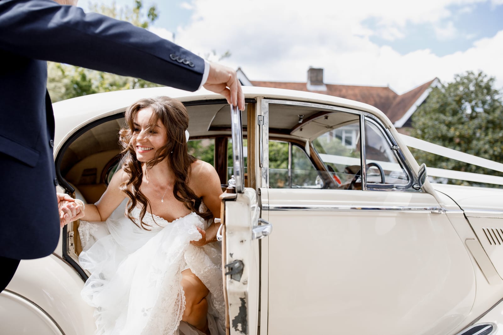 bride arriving in car for wedding in amersham