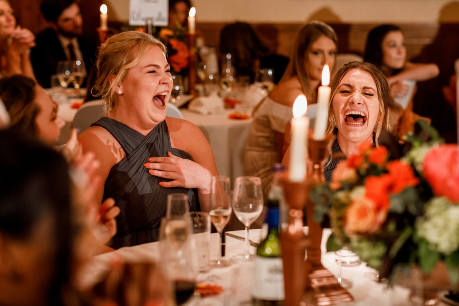 guests laughing at wedding speech