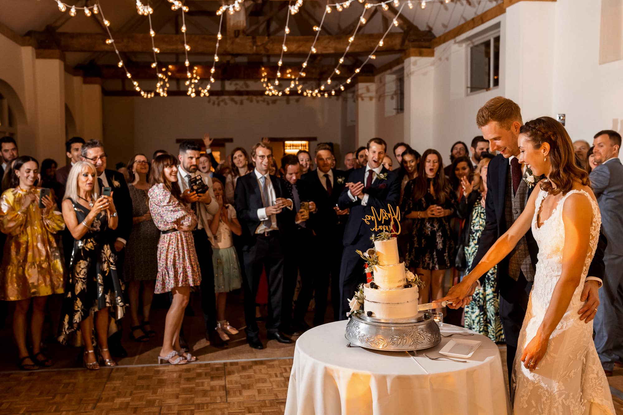 cutting cake at dorney court wedding