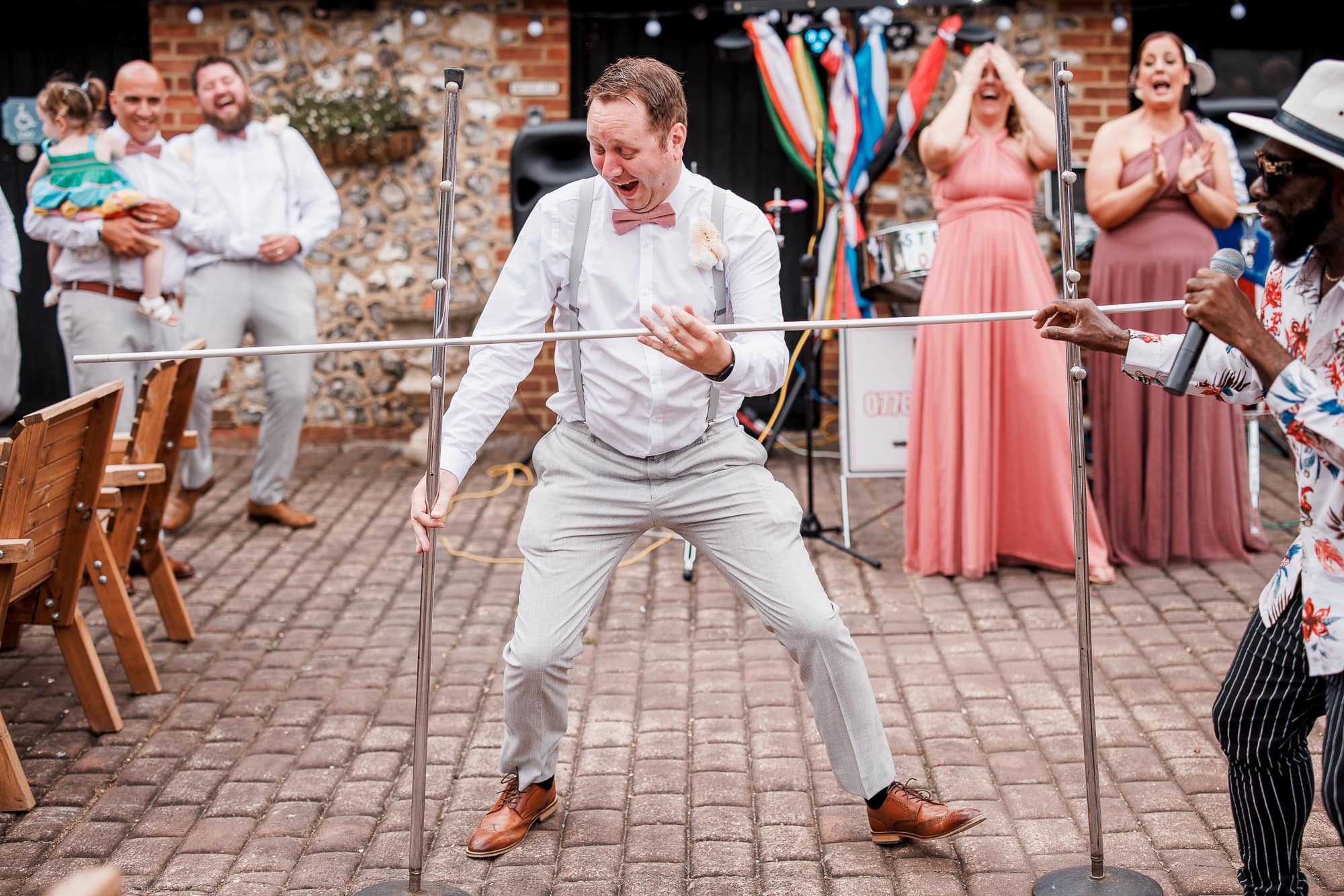 limbo dancing at wedding